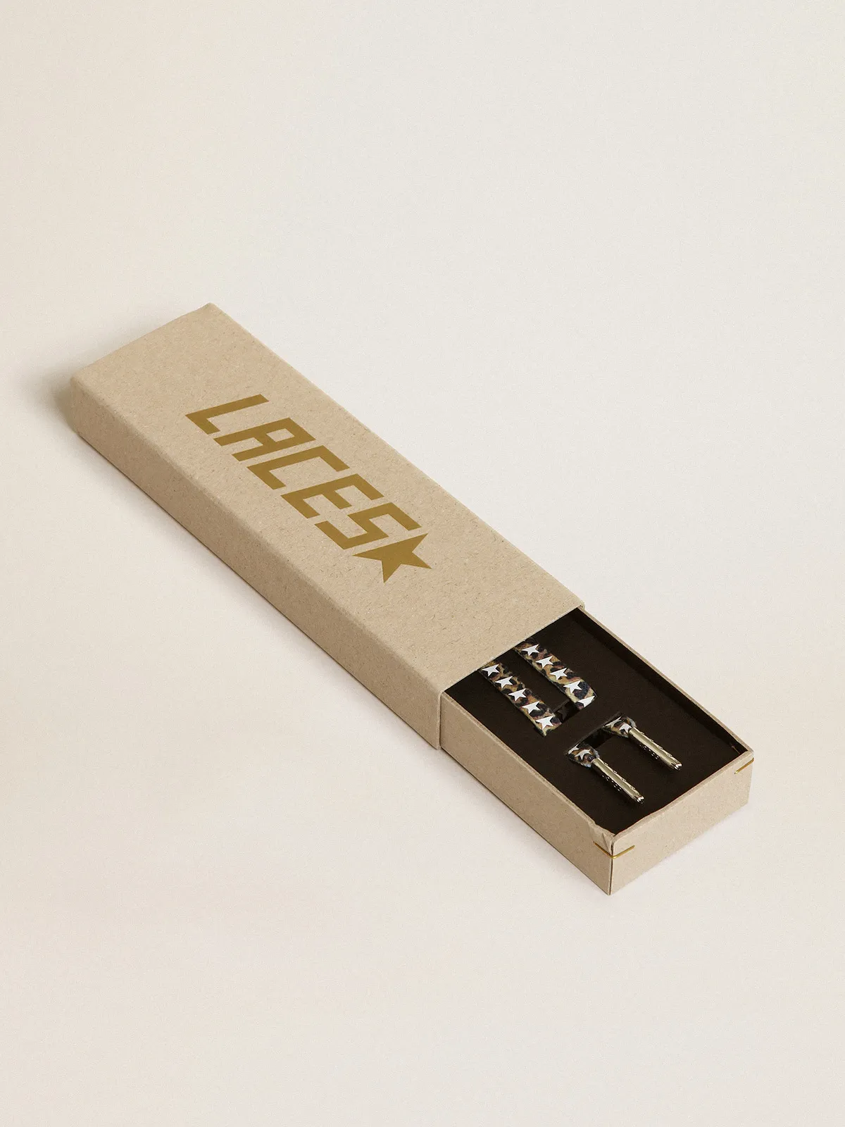 Beige and brown leopard-print laces with contrasting white stars