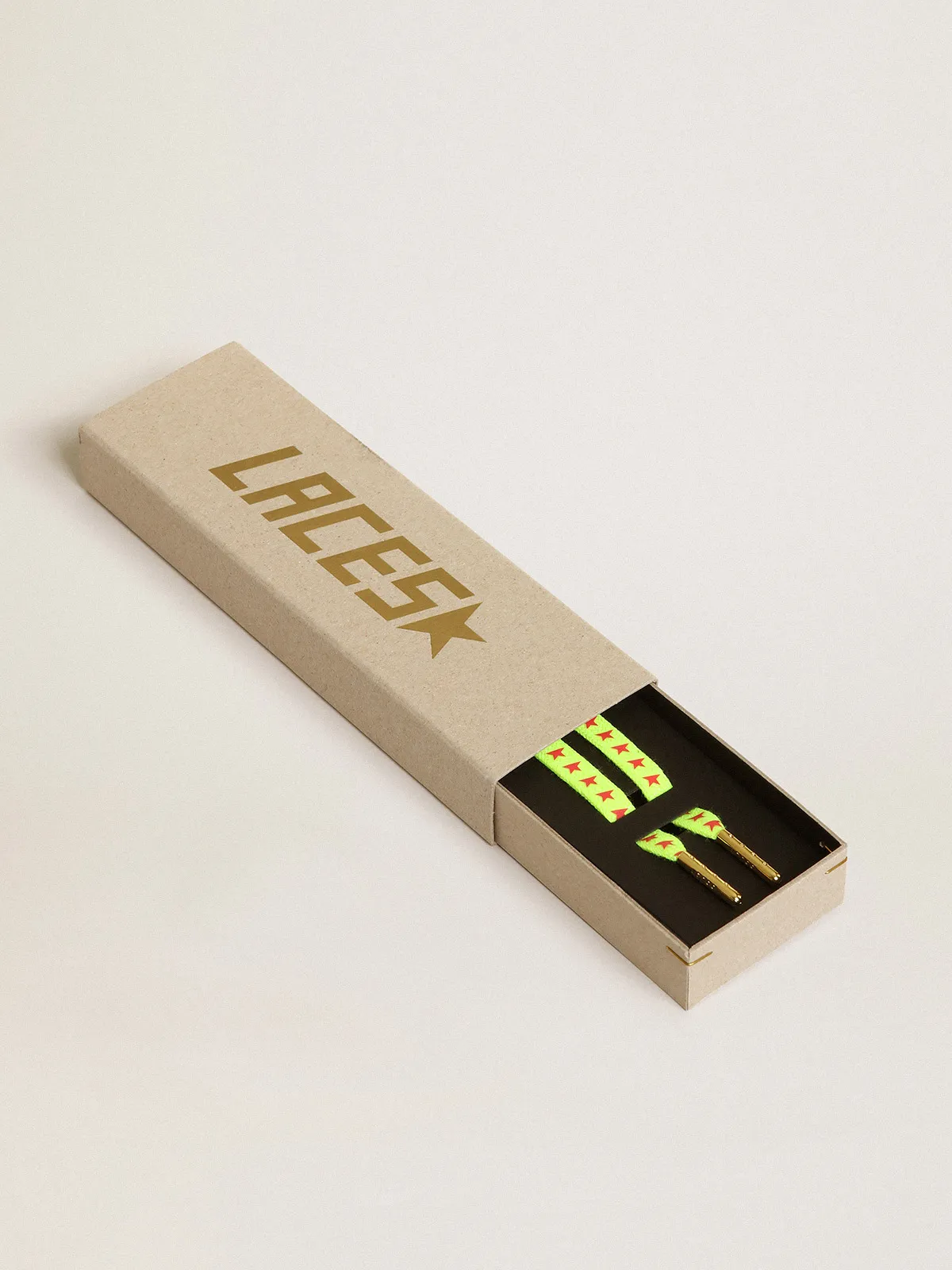 Fluorescent yellow laces with contrasting orange stars