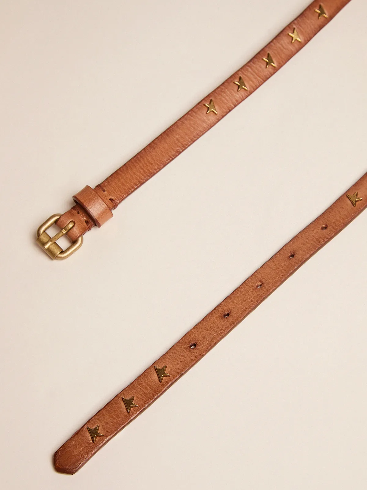 Molly tan leather belt with star-shaped studs