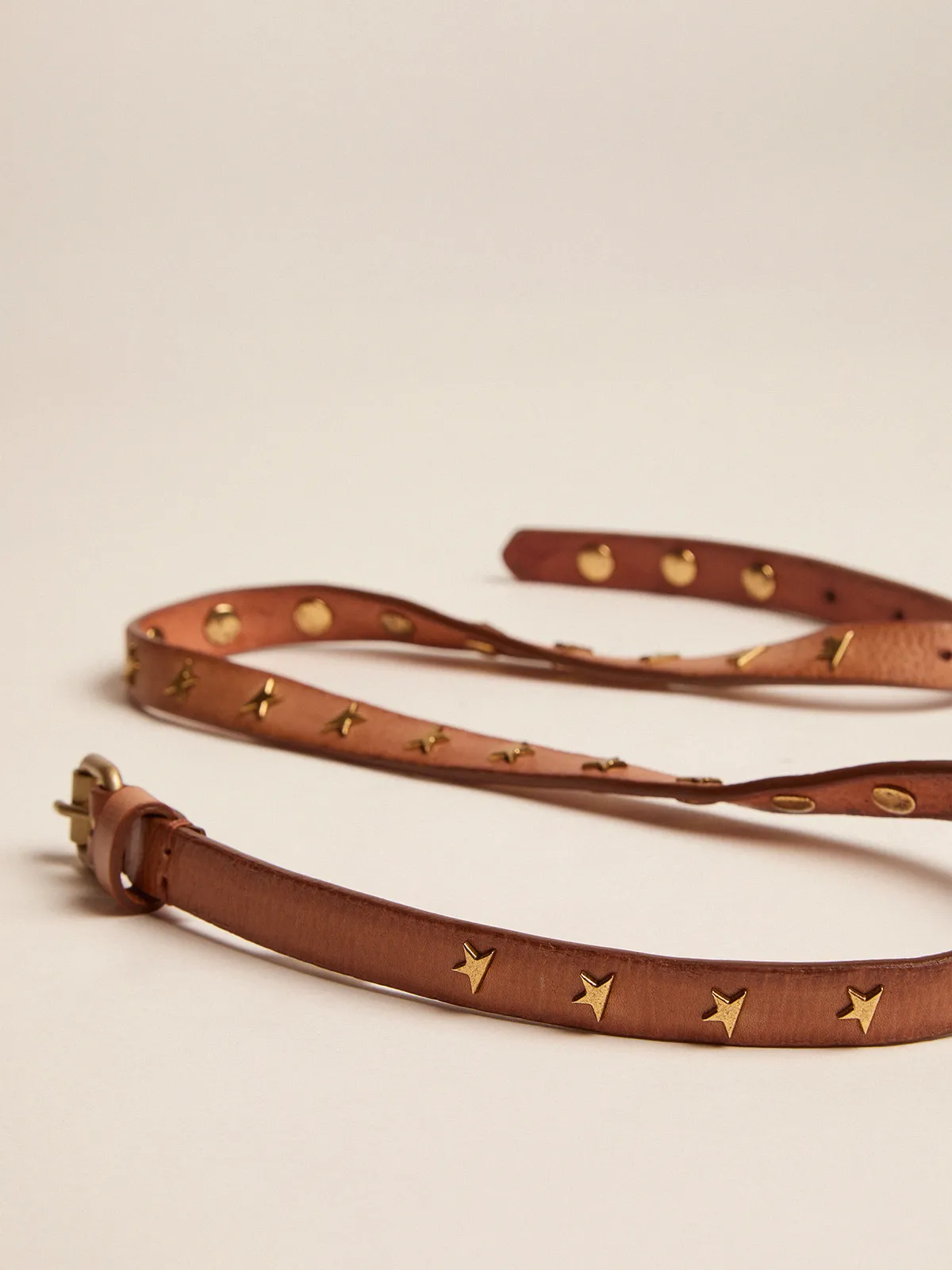 Molly tan leather belt with star-shaped studs