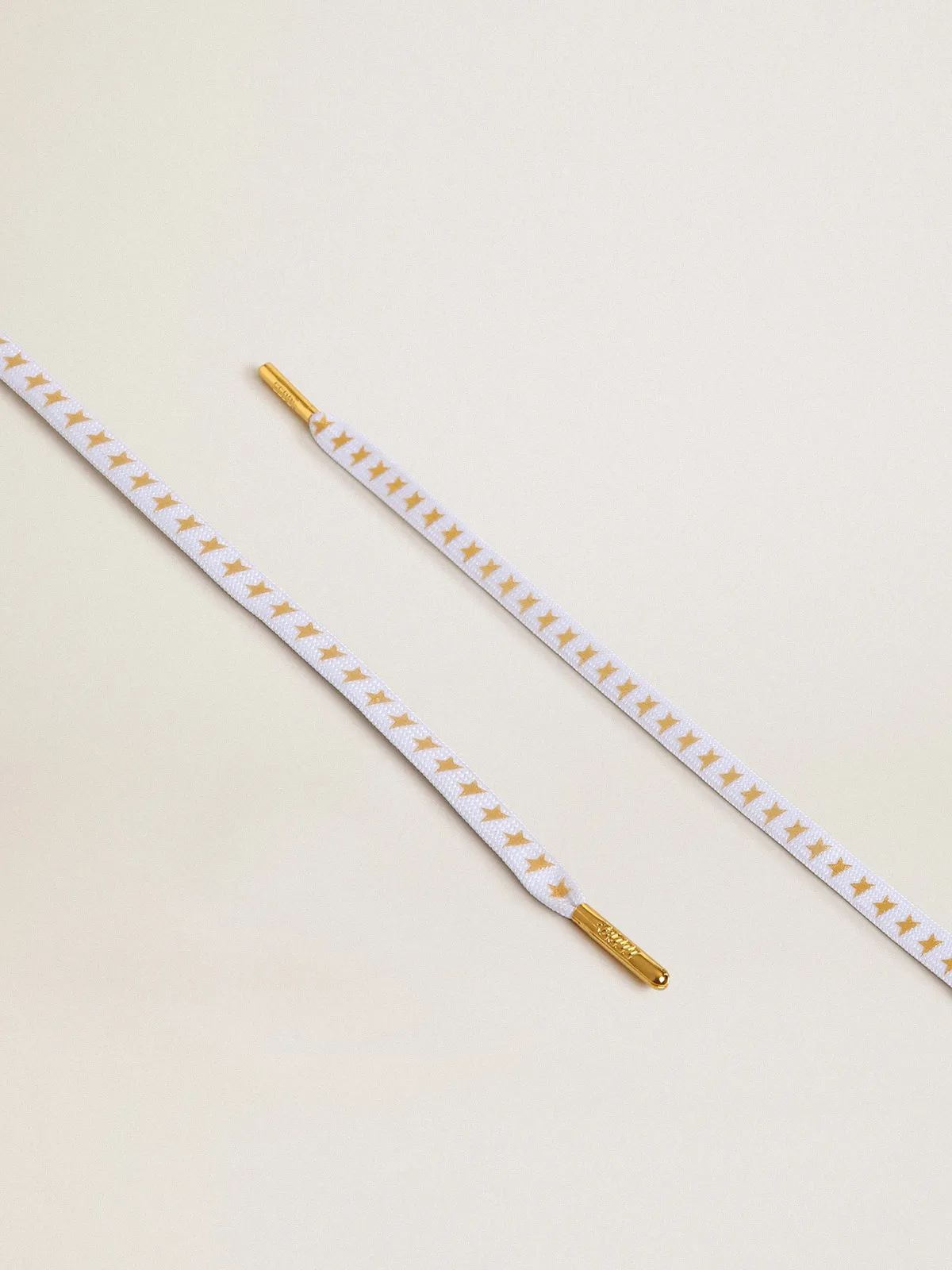 White laces with gold stars